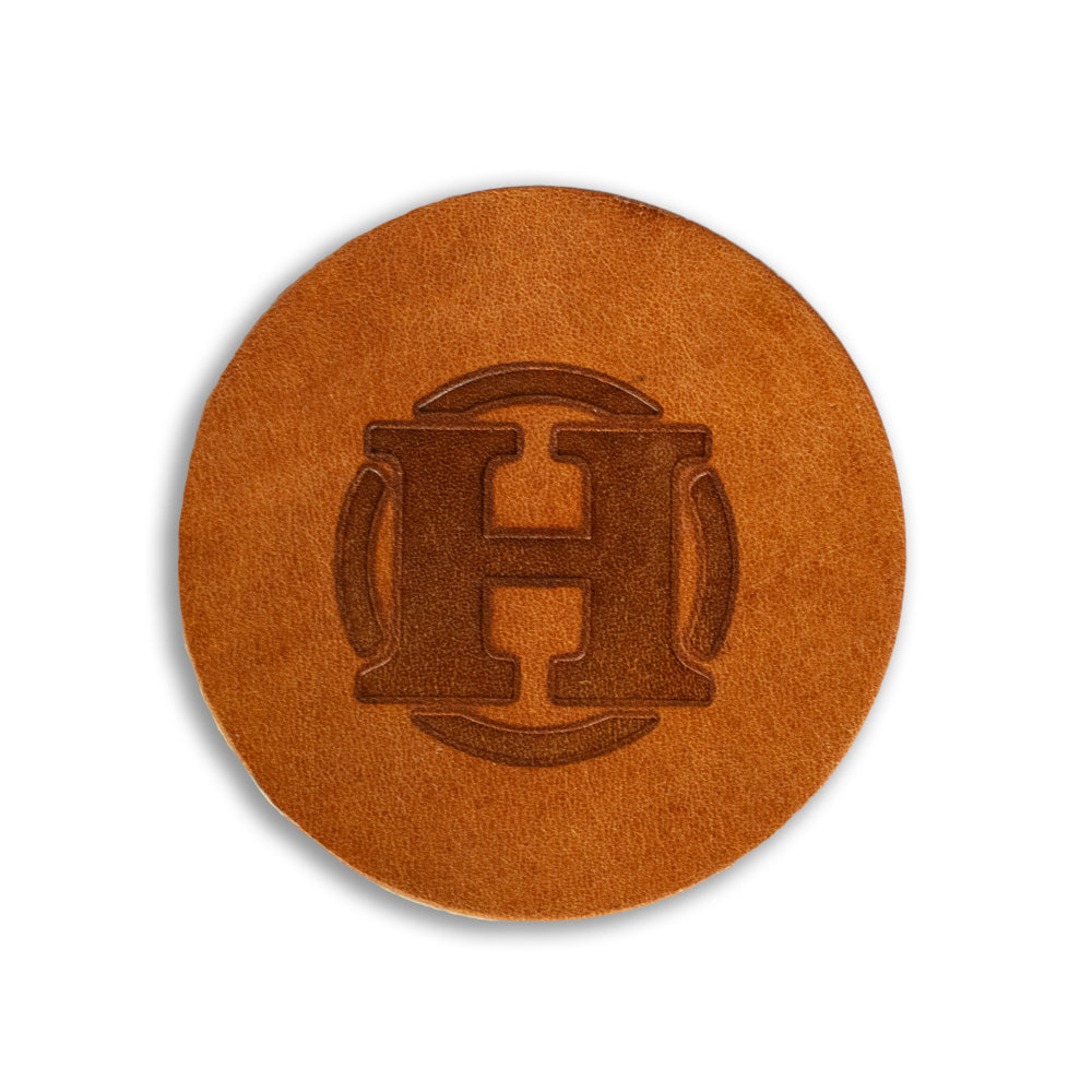 Round Leather Coaster Hero Image in Retro Tan