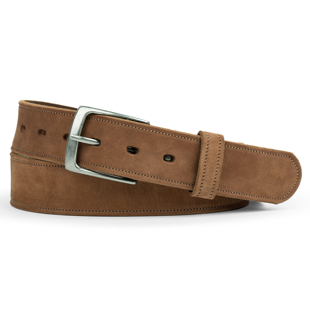 The Suede Belt - 1.5&quot; by Hanks Belts is a brown leather belt, made in the USA. It features stitched edges, multiple adjustment holes, and a rectangular shiny silver buckle, rolled up neatly.