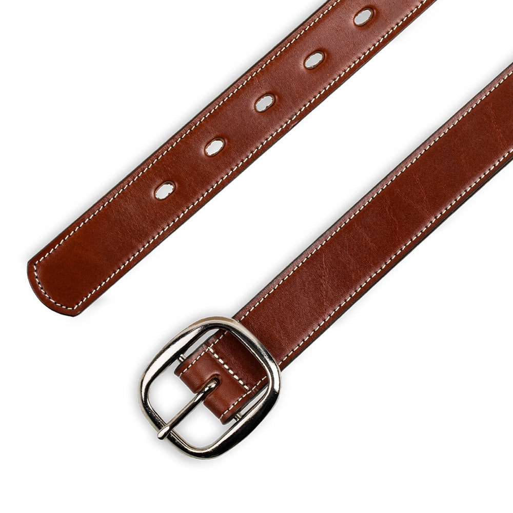 The Eloise Belt - 1.25&quot; by Hanks Belts is a women&#39;s premium brown belt crafted from vegetable-tanned leather, featuring exquisite white stitching and a shiny center bar buckle. Designed with multiple adjustment holes, it stands elegantly against a plain white background.