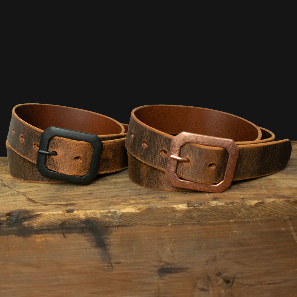 Hanks Relic Crazy Horse Belts sitting on wooden box