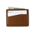 Crafted with durability in mind, the Cumberland Bison Card Holder from Hanks Belts is a finely-made USA product featuring peanut brown leather. This elegant card holder showcases two white cards in its slots and a $50 bill partially visible at the top. The design is complemented by straightforward stitching and an embossed Hanks Leather Goods logo on the front, offering an ideal blend of style and functionality.