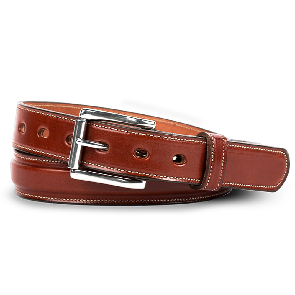 The Esquire Premium Dress Belt by Hanks Belts, crafted from rich vegetable-tanned leather, features white stitching and a shiny silver buckle. With multiple holes, it threads effortlessly through the buckle for a refined finish.