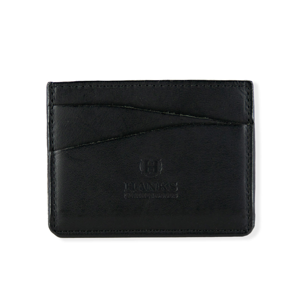 A black leather Cumberland Bison Card Holder from Hanks Belts, featuring the logo and text &quot;Hanks Leather Goods&quot; embossed in the center. Made from durable bison leather, it has two slanted card slots on the front with visible stitching along the edges.