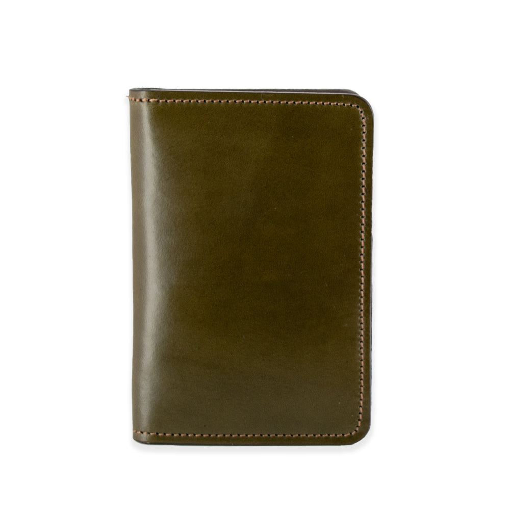 The Superior Front Pocket Bifold by Hanks Belts is a dark green leather notebook with rounded corners and visible stitching, crafted from premium harness leather, featured vertically on a white background.